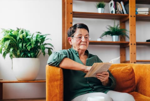 older woman reading older woman reading