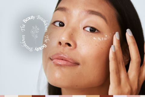 woman applying eye cream woman applying eye cream