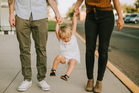 Family Walking Down the Street