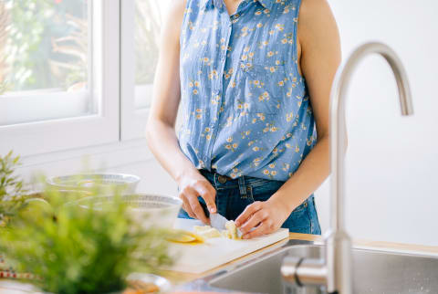 Anonymous Young Woman In The Kitchen