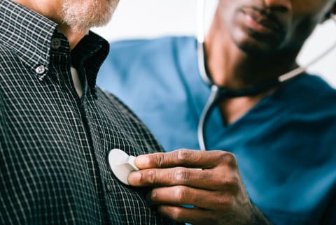 Doctor Examining a Patient with a Stethoscope