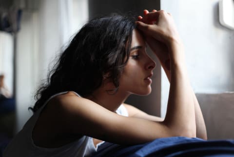 Profile Of A Young Woman On A Natural Light