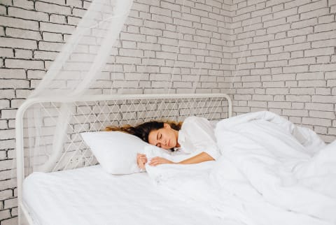Woman Sleeping in Bed Woman Sleeping in Bed