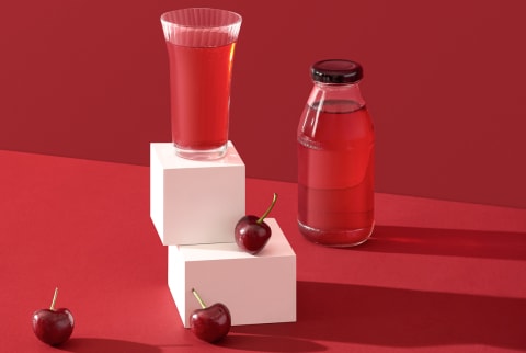 A Glass Of Cherry Juice And Cherry Fruit