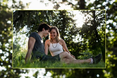 Happy couple relaxing at the Park